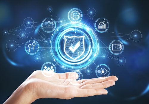 hand-holding-creative-digital-shield-on-blurry-bac-2026-01-11-08-31-08-utc