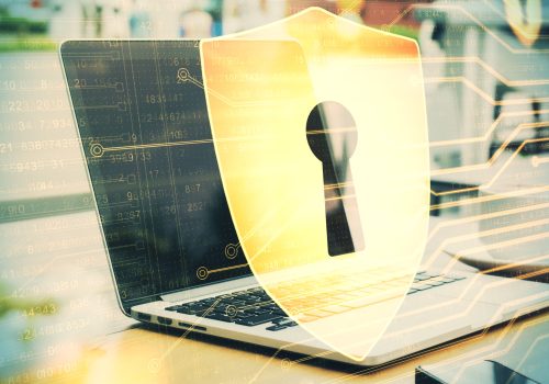 laptop-on-table-with-antivirus-shield-hologram-we-2026-01-11-08-47-32-utc